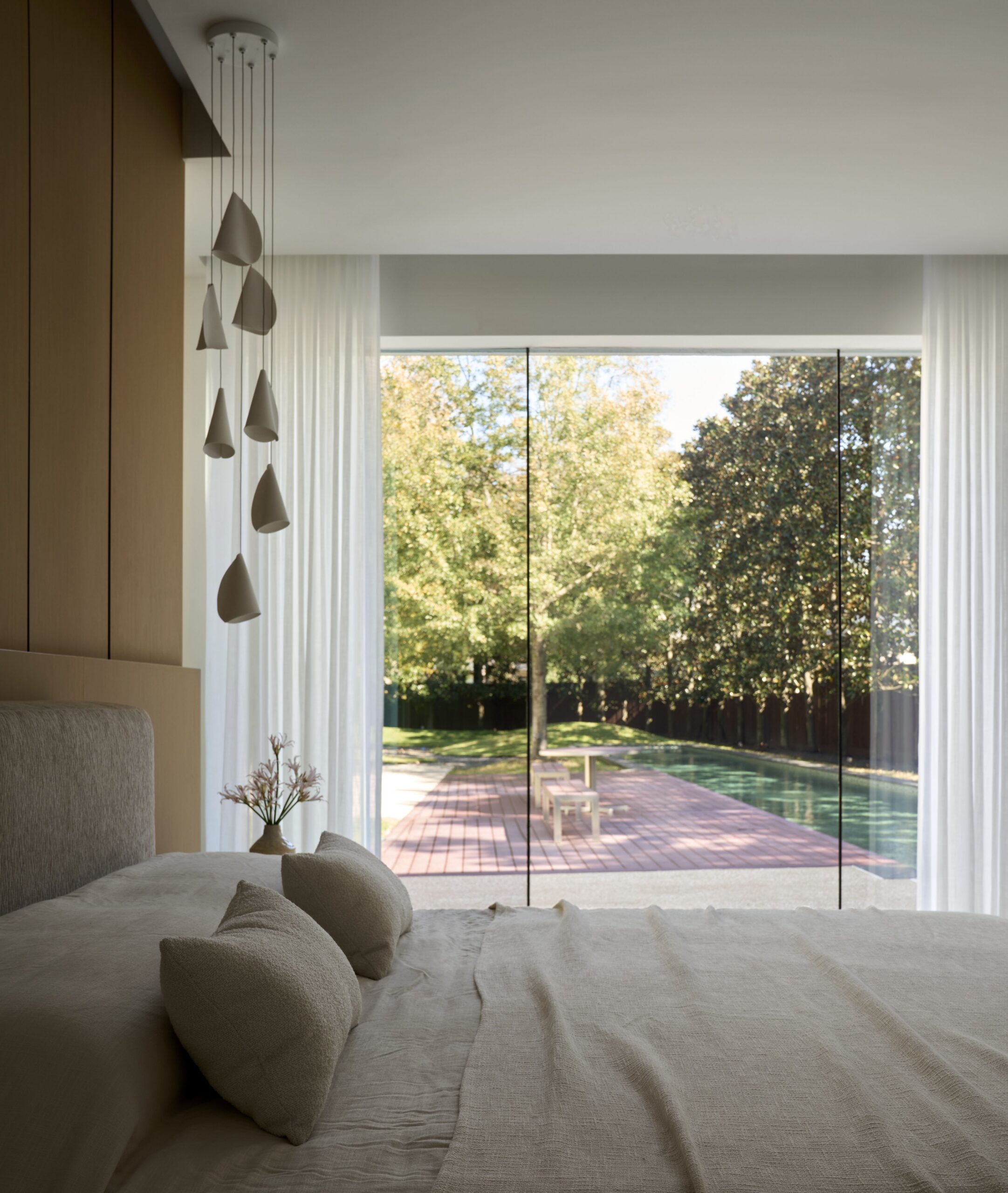 Pine Wood Estates by Nina Magon | A refined modern residence in Houston’s Memorial neighborhood blending architectural stone, bespoke furnishings, and curated contemporary art.