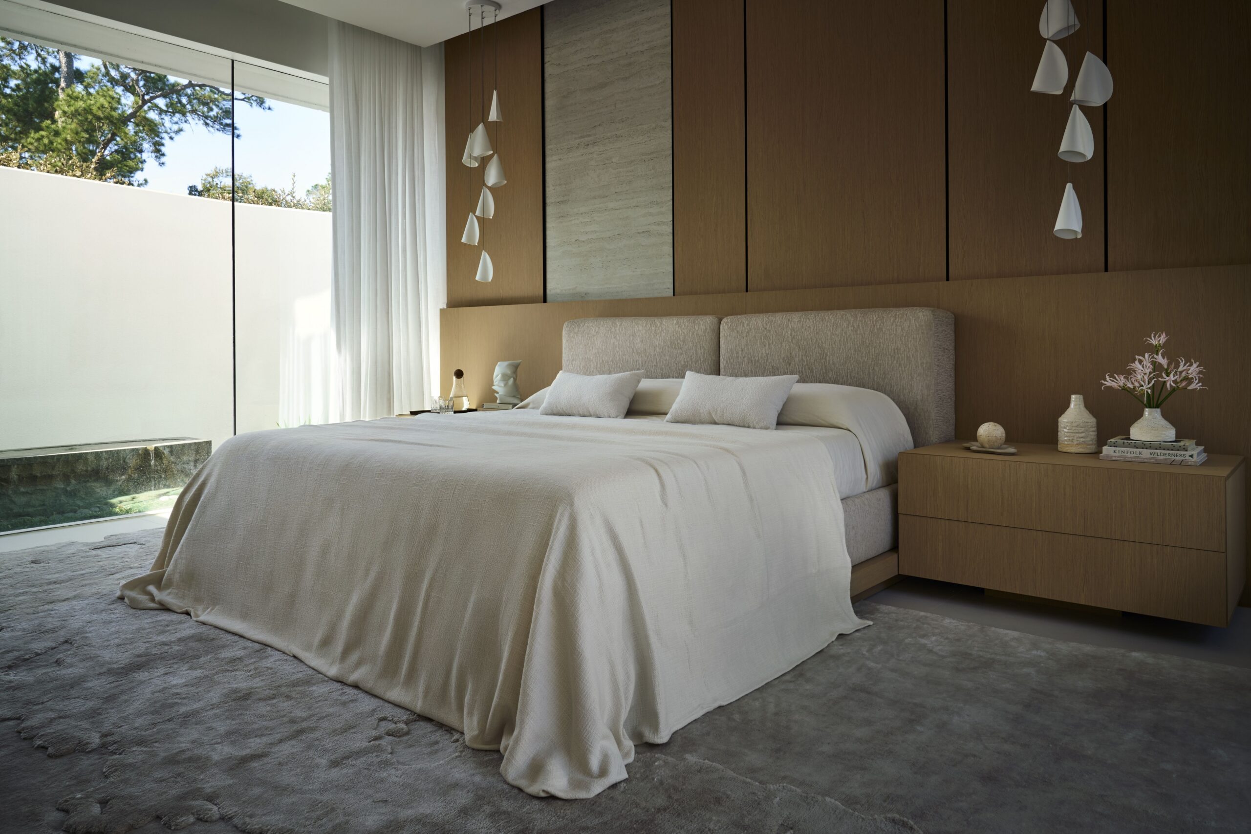 Pine Wood Estates by Nina Magon | A refined modern residence in Houston’s Memorial neighborhood blending architectural stone, bespoke furnishings, and curated contemporary art.