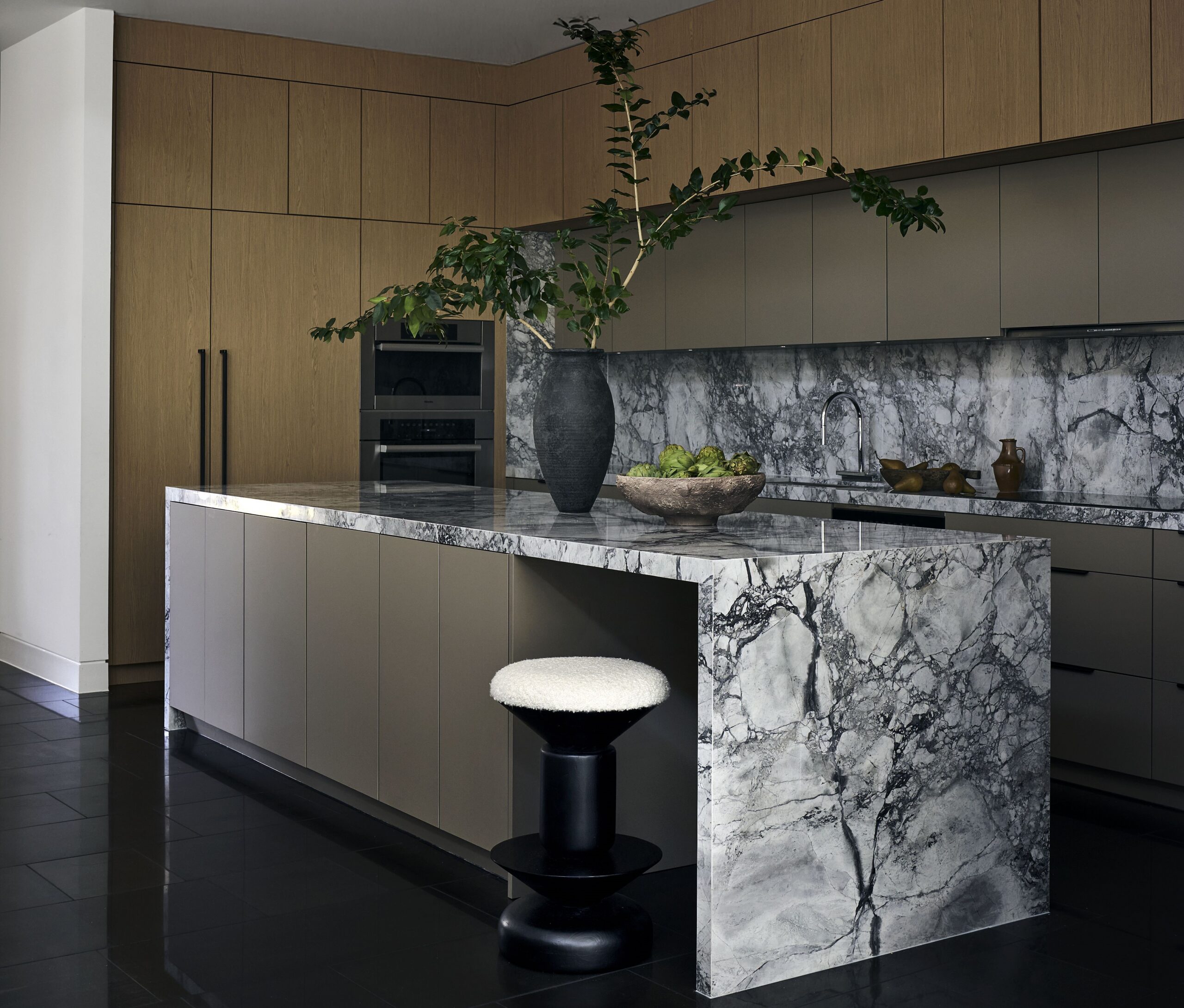 Pine Wood Estates by Nina Magon | A refined modern residence in Houston’s Memorial neighborhood blending architectural stone, bespoke furnishings, and curated contemporary art.