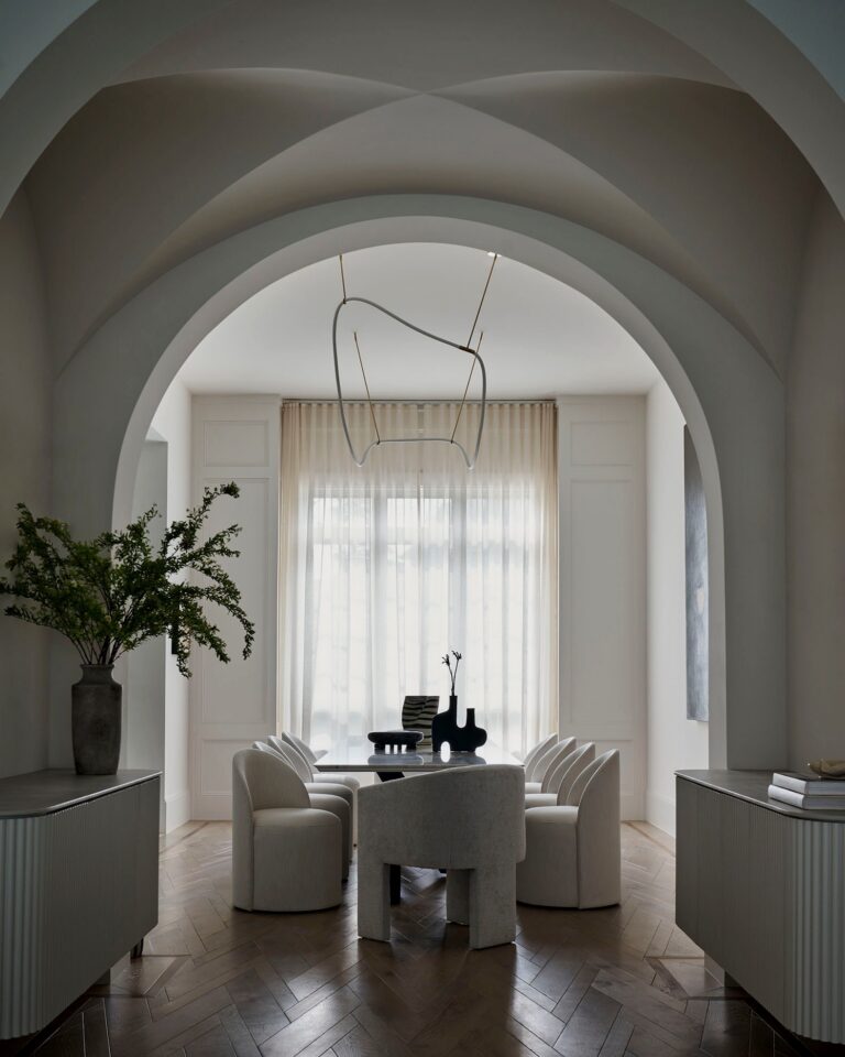 Luxury full-service interior design by Nina Magon Studio featuring sculptural arches, bespoke millwork, and curated furnishings